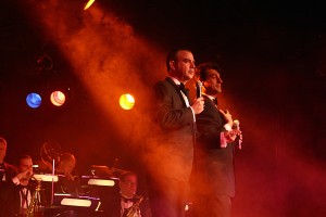 Joey Bishop (played by Sandy Hackett) and Dean Martin (played by Tony Basile) perform on the infamous Congo Room stage at the Sahara Hotel.